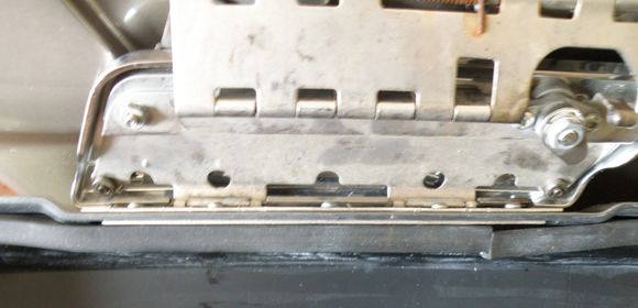 strap removed and latch spread open