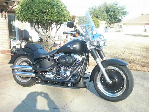 Full Cruise mode with windshield, rear seat and sissy bar installed Jan2011. Front chin spoiler, aux lights, added also.