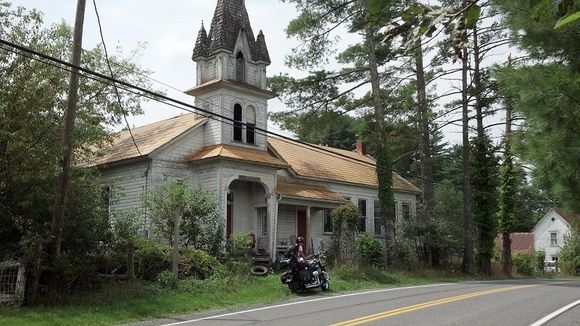 Old abandoned church on a back road in VA with people living in it