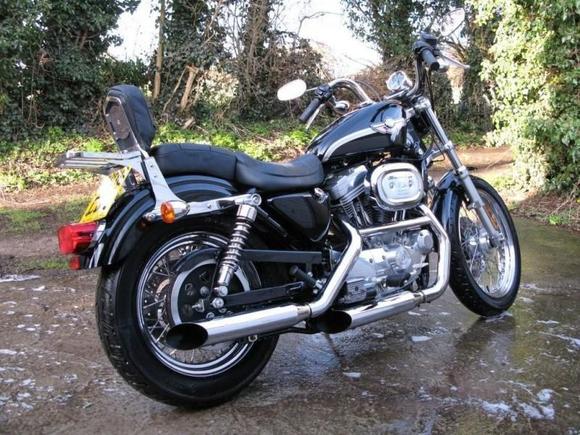 Sportster XLH883 (Low).A 2003 Anniversary model Purchased January this year. Pic shows her as I got her, with pillion pad and sissy bar now removed for use later.