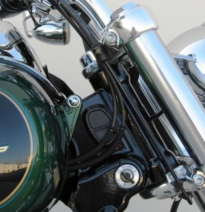 Installed (JB Weld) top grommet plug, recessed it like the bottom portion of the grommet.  Cleaning Up The Wire Harness. Info here: http://www.hdforums.com/forum/dyna-glide-models/165942-cleaning-up-the-wire-harness.html