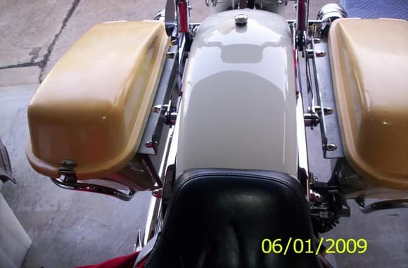 1970'S SPORTSTER HARDBAGS ON 1993 HERITAGE
SOFTAIL.  Didn&quot;t use existing two holes just plugged them
up with 1/4-20 acorns, used the rear end hole as a guide
to butt up against the detachable hardware button head.
The front existing hole on the sportster bag bracket was
also capped off with a 1/4 acorn.
