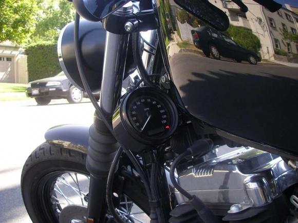 Drag bars with 6" riser, relocated speedometer, new light and assembly, flipped over mirrors, Progressive shocks, Hance and Vines Competition exhaust and fuel pack and a Screaming Eagle Stage 1 intake.
