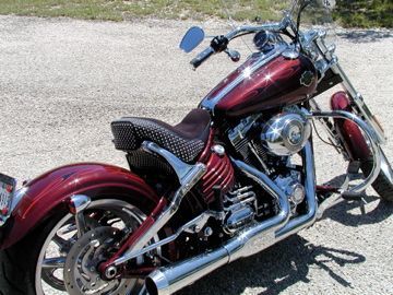 As a solo seat. The chrome seat supports were hidden by the original stock seat, but now are beautifully exposed.