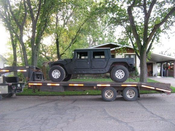 Hummer1 - Just back from paint, snorkel, hood scoop, front bumper, smoked glass, etc. has to be put back on, and 3" lift waiting for install...