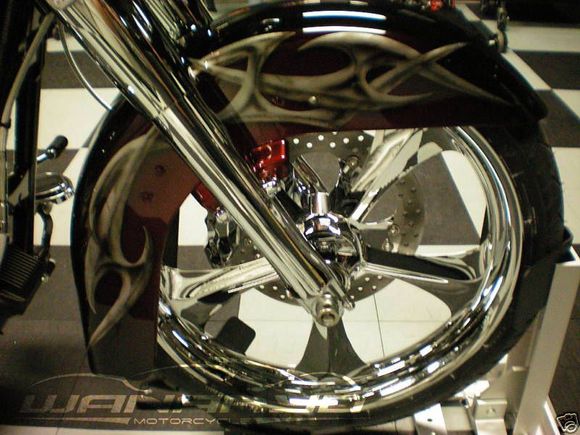 2010 Street Glide with our Adrenaline wheels and single disk conversion kit. Bike built by Phil Cerulli of Stealth Cycles.