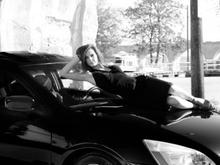 old friend of mine posing on my car during photo shoot