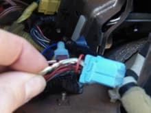 The plug for the radio.  The white/green wire is hot all the time and is fused.