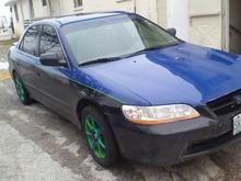 New paint job with green pen strip along with blue and green rims
