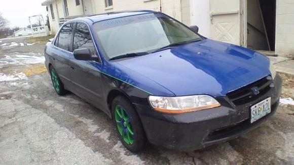 New paint job with green pen strip along with blue and green rims