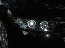 A close up shot of the new headlights.  Like?