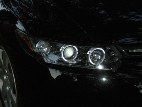A close up shot of the new headlights.  Like?
