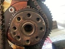 With the bearing brace/caps not installed (a mistake on my end), there is still too much tension on this chain.  Take one hand (not shown due to working the camera) and try to pull the chain off the crankshaft.....