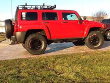 my H3 with 35" General Grabber ET's w/ red lettered side walls.