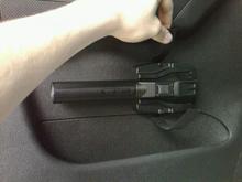 Magnetic base holds it in place, but the velcro holds it in place incase the door shuts too hard and dislodges it.