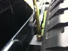 9' military antenna with custom painted bracket ($2 from home depot)