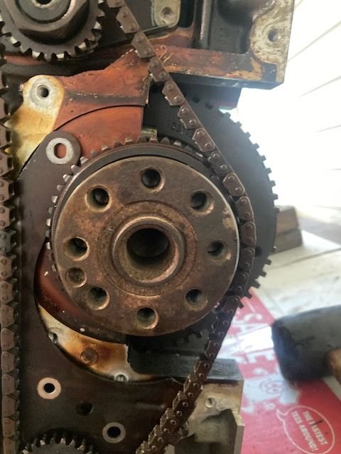 With the bearing brace/caps not installed (a mistake on my end), there is still too much tension on this chain.  Take one hand (not shown due to working the camera) and try to pull the chain off the crankshaft.....