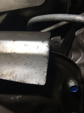 Close up of heat shield and cooler line