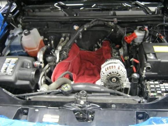Motor with Intake Removed.  Spark Plugs have been Replaced and Balancer is Pinned for Supercharger.