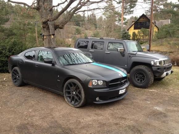 My Charger with 22" SRT10 wheels and my wifes H3 Alpha with 35's