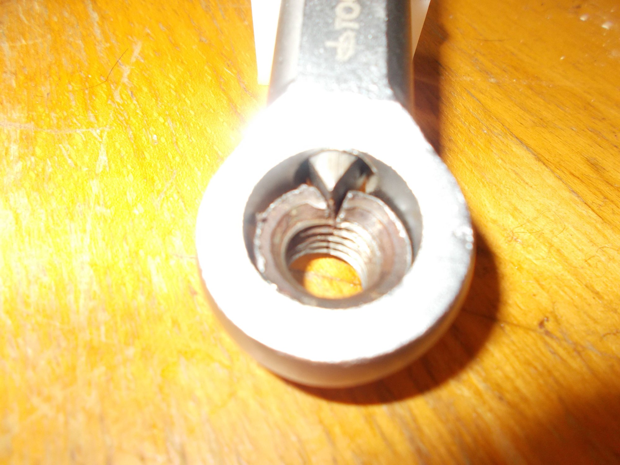 Finally . . . one very dead parrot!!  My initial intention was to just use the nut splitter to give extra grip.  But turning the bolt head caused sufficient stress to crack the knurled flat rivet nut . . job done
