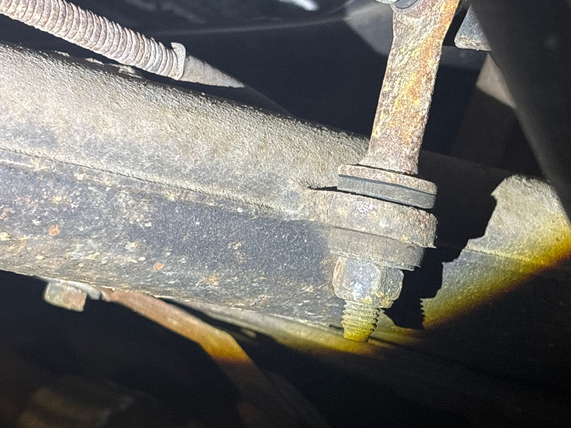 One of my oem rear sway bar links, showing rubber above and below control arm mount(previously mistaken for sway bar)