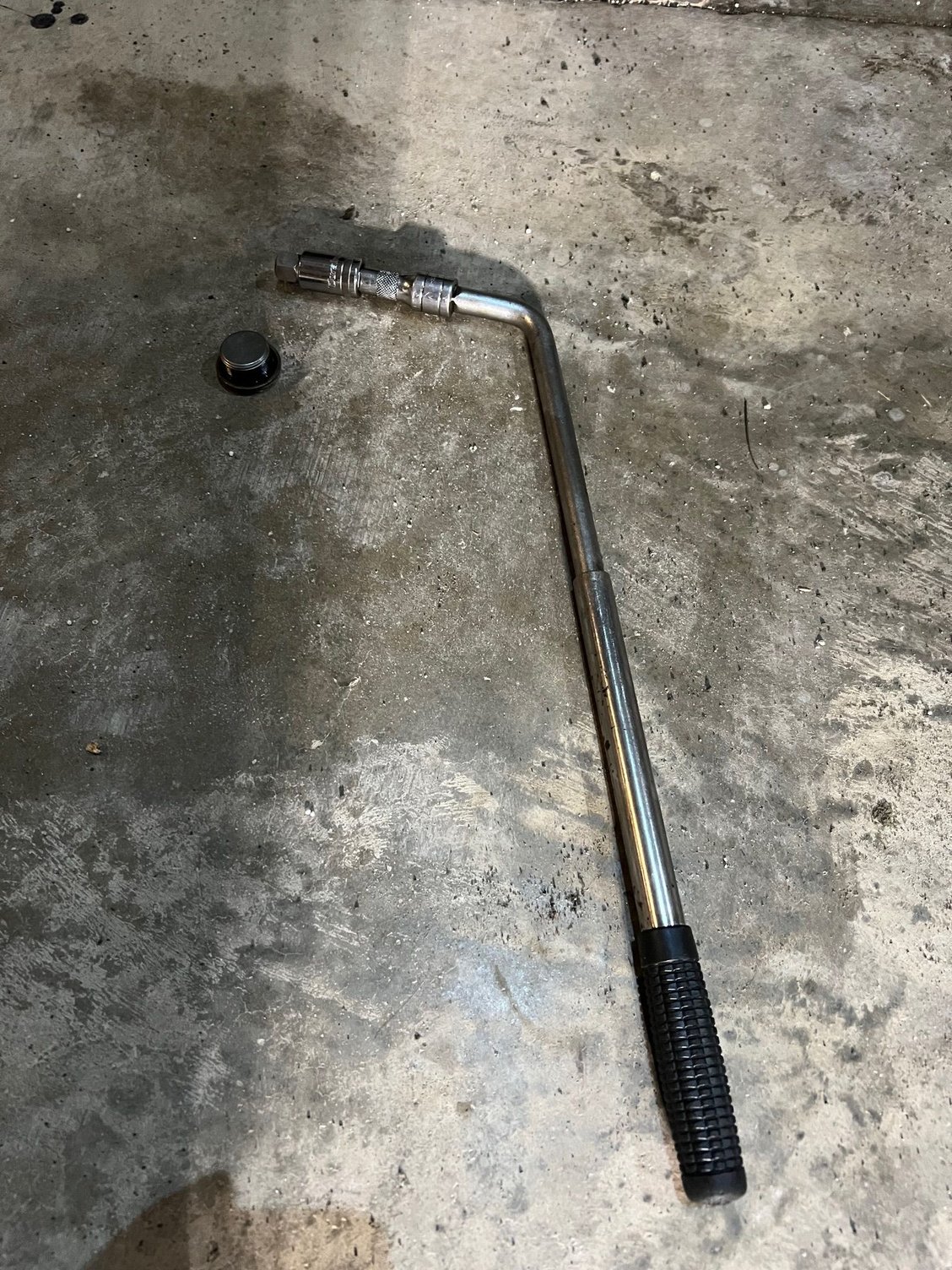 Used this to break loose.  Really hard to fit in ratchet and extenders in tight space.  Luckily had this wheel leg breaker bar.