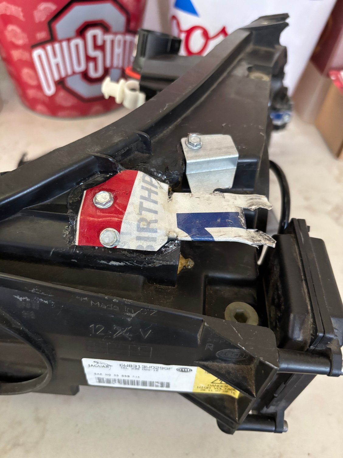 Silver piece at top was used to make adjustments by bending it up or down.