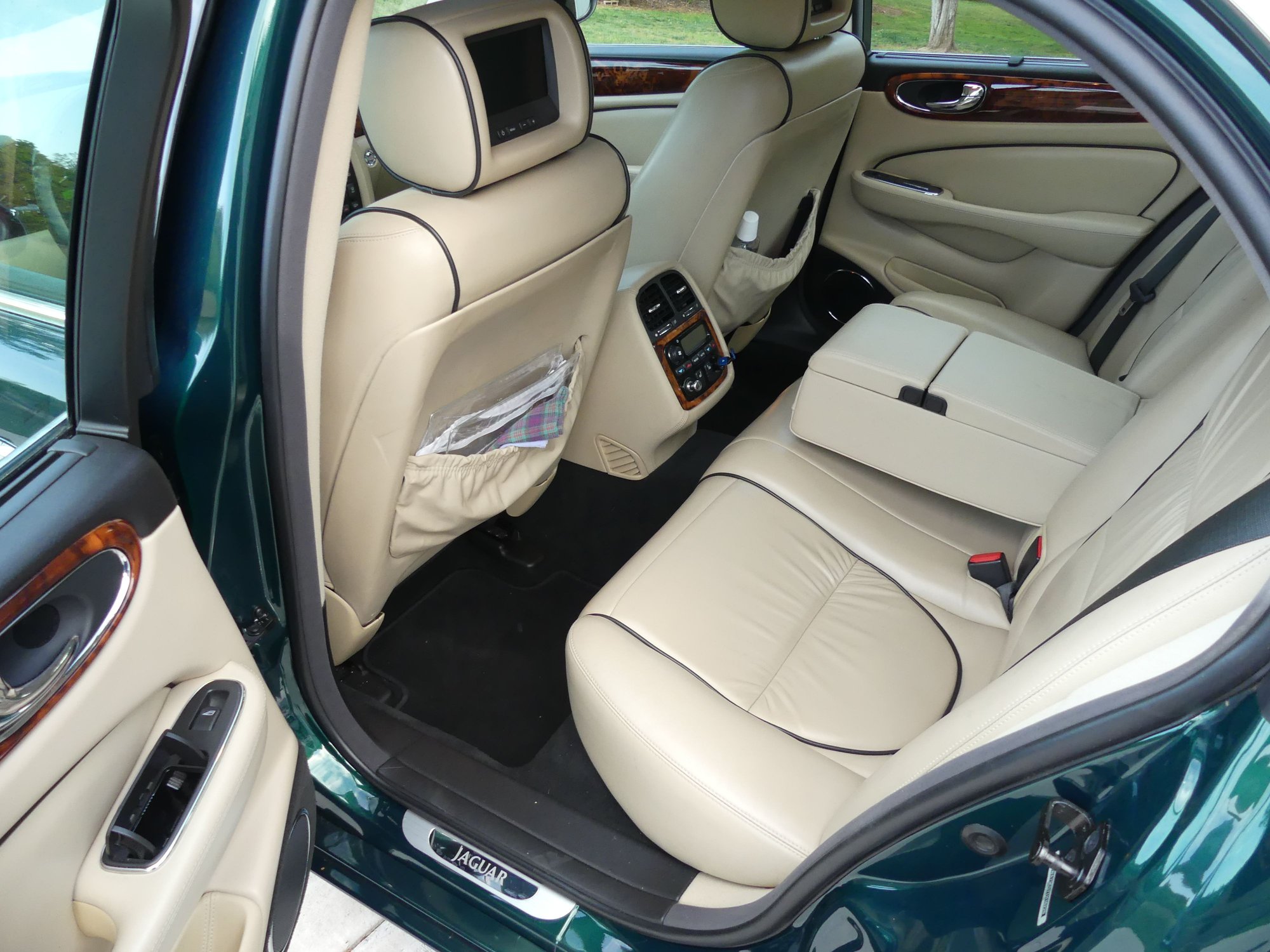 Rear individual HVAC and heated seats; full multimedia center
