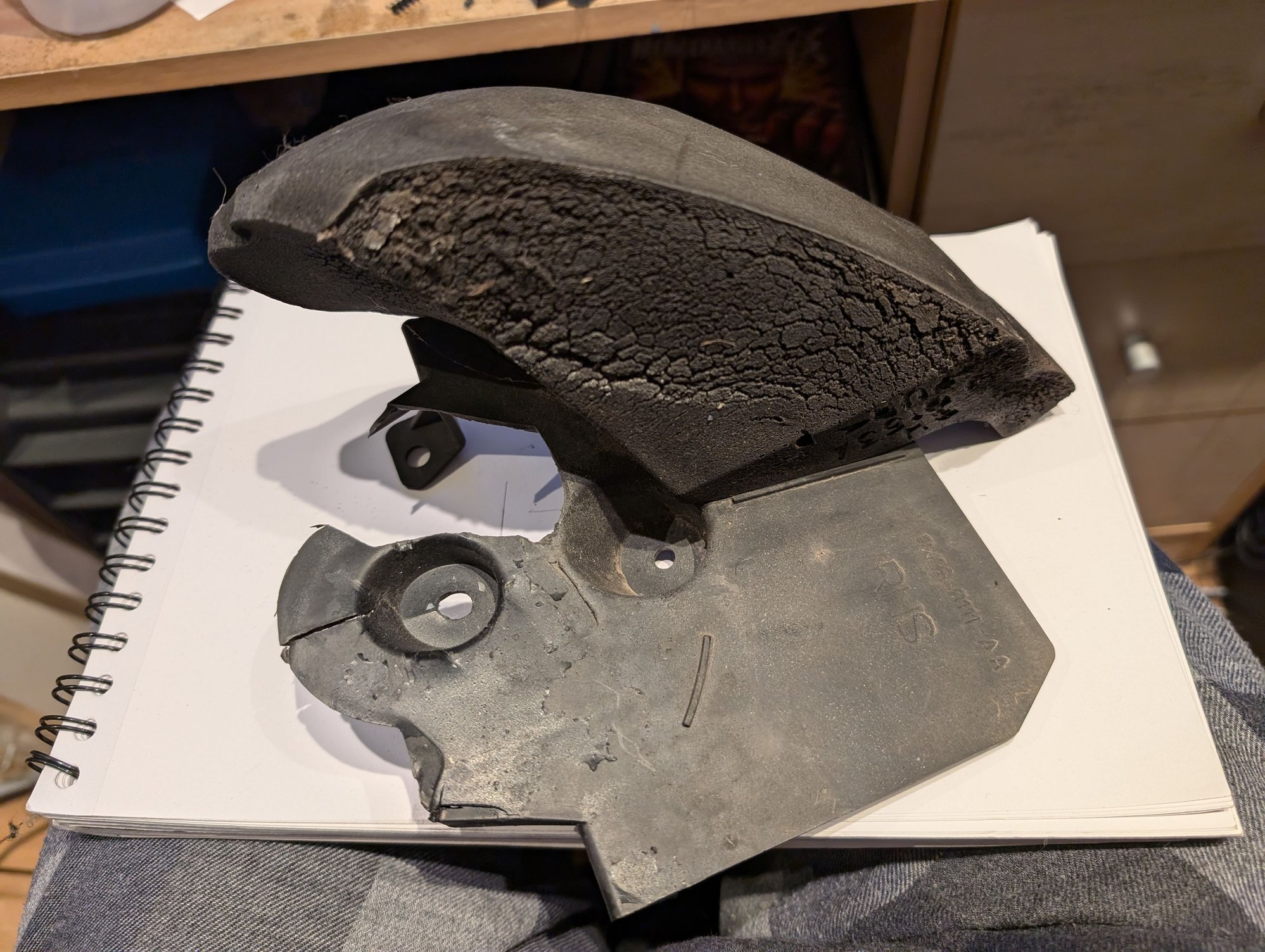 Deflector with foam attached, the foam is handed whereas the bracket fits both left and right sides of the car 