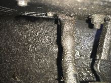 Years of dirt and oil.