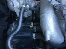 Thing under the thermostat housing.