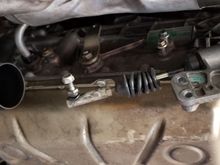 Unplug the transmission harness and remove the linkage