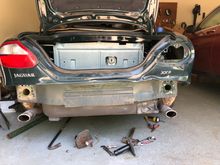 The bottom lip of the trunk is a pretty complex bend - might drill out the spot welds and weld a donor piece from Jag 2.  Additional, you can see the right side is up maybe a couple of inches.
