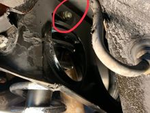 Nut outside the cage at rear