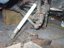 One the Steering Arm was cut off, I got hold of the Stub of the Caliper Bolt with a pair of Stilson Wrenches and it came out dead easy!