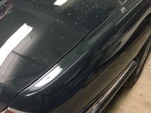 Repaired right rear fender.  Good paint match.  The spots you see are from the polishing compound...car has not been washed yet.