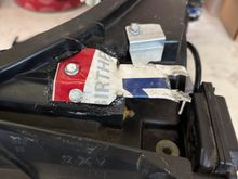 Silver piece at top was used to make adjustments by bending it up or down.