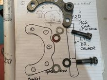 two holes on this bracket to install bolts, before mounting caliper,  otherwise non-accessible.