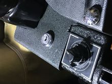 I fashioned this larger ignition switch plate.