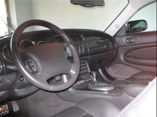 Carbon fiber interiour - but not a "R" on the steering wheel