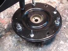 Compress everything with the mounting nuts and re-rivet