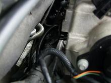 Step 7 
More fun stuff! You can barely see the 1/4 inch drive ratchet, they have a bolt in the back of the manifold, remove it completely.