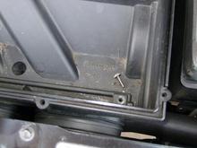 Step 3
Remove the air filter cover and remove the two phillips screws then pull up on the box assembly to remove from the mounting flange.