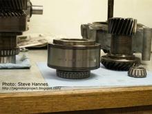 Steve Hannes: These discs are "slipping" in normal operation. When there is a significant difference in rotational speed between the drive and driven discs (as in rear wheel slippage), the special viscous fluid heats up, expands (actually gels) and the friction between the drive and driven discs locks them causing a torque transfer to the front wheel output shaft. As soon as the drive and driven shafts slow to a closer matching speed, the fluid cools, thins, and unlocks the drive/driven discs freewheeling the front wheels again. This is all there is to the X-Type AWD Transfer system. There are no electronics controlling the torque distribution in this system. 
**** more info: http://jagmotorproject.blogspot.com/2007/02/motor-project-17-transfer-time.html   ****
