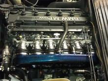 IMAG2946 Powder coated Plenum installed. Sanded and buffed the 6 throttlebodies.