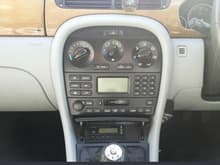 a Jaguar 'Classic' centre console  - but note the USB chargers on the right of it, and the header module in the ashtray area for a Kenwood 6 CD changer