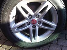 Red wheel badge