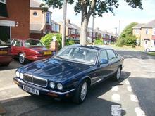 100 1586 my new xj8 in the background next to my wifes car  the new plate i put on the xj8 matches my wifes car  i think we are a bit sad the x300 i sold the x300 four £725.00 the first one to come and look took it  it was a rely good one