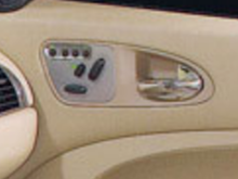 10-Way Seat Adjustment Controls (Standard interior package)  If you have this, your dash, door panels, etc. are not leather.  